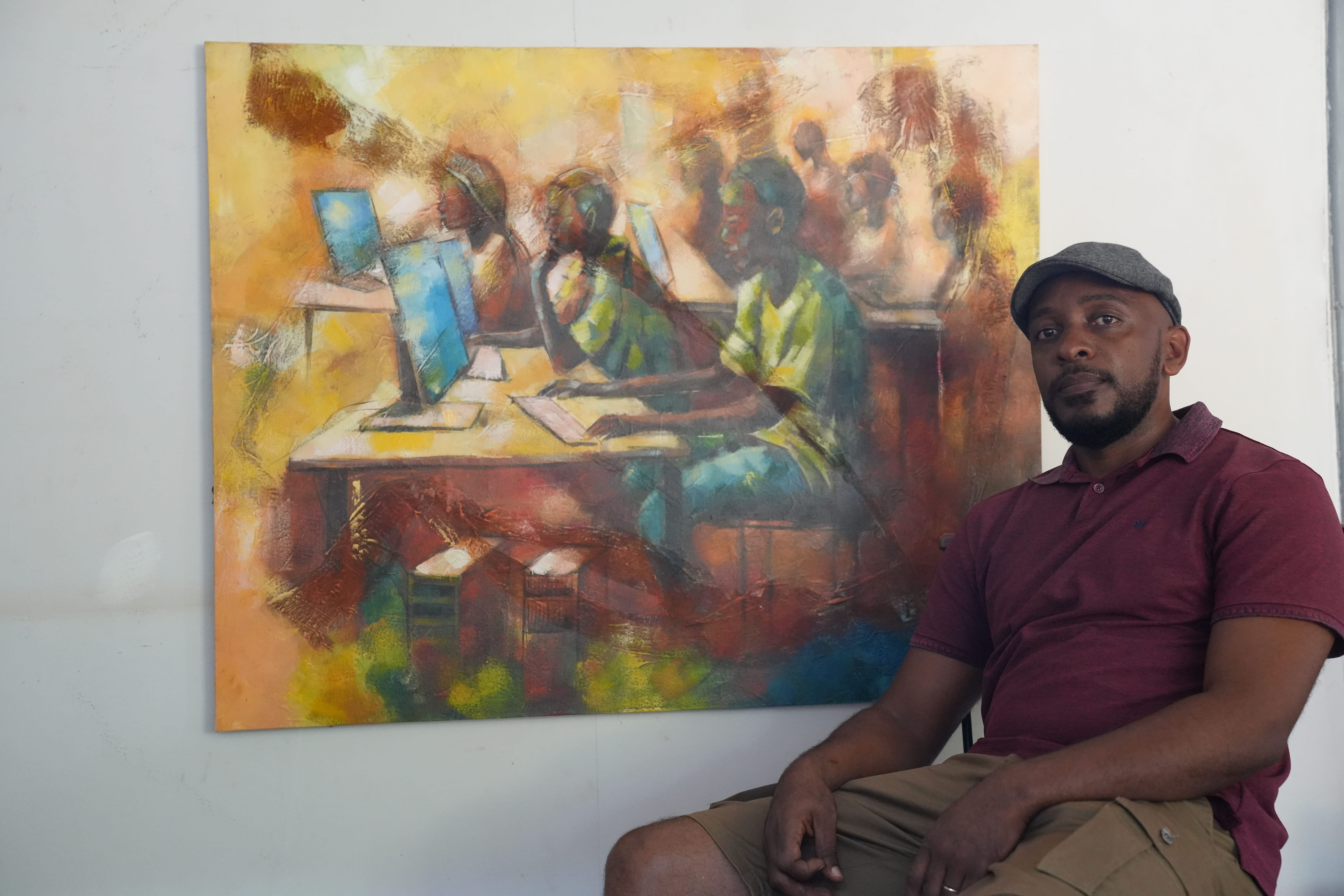 The artist working in their studio